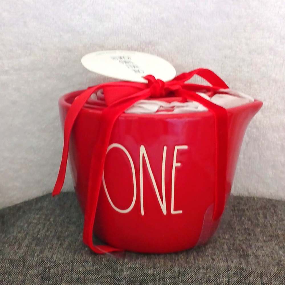 Red heart cut out measuring cups by Rae Dunn